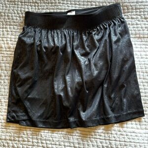Gu black golf skort. Like new. Size small.